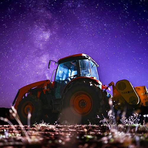Award-winning photograph Tractor on the Milky Way by Tea Chen , 2026 MUSE Photography Awards Gold Winner