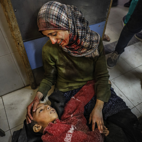 MUSE Photography Awards Platinum Winner - “A Mother’s Farewell: A Human Cry Against Genocide” by Abdelrahman Alkahlout